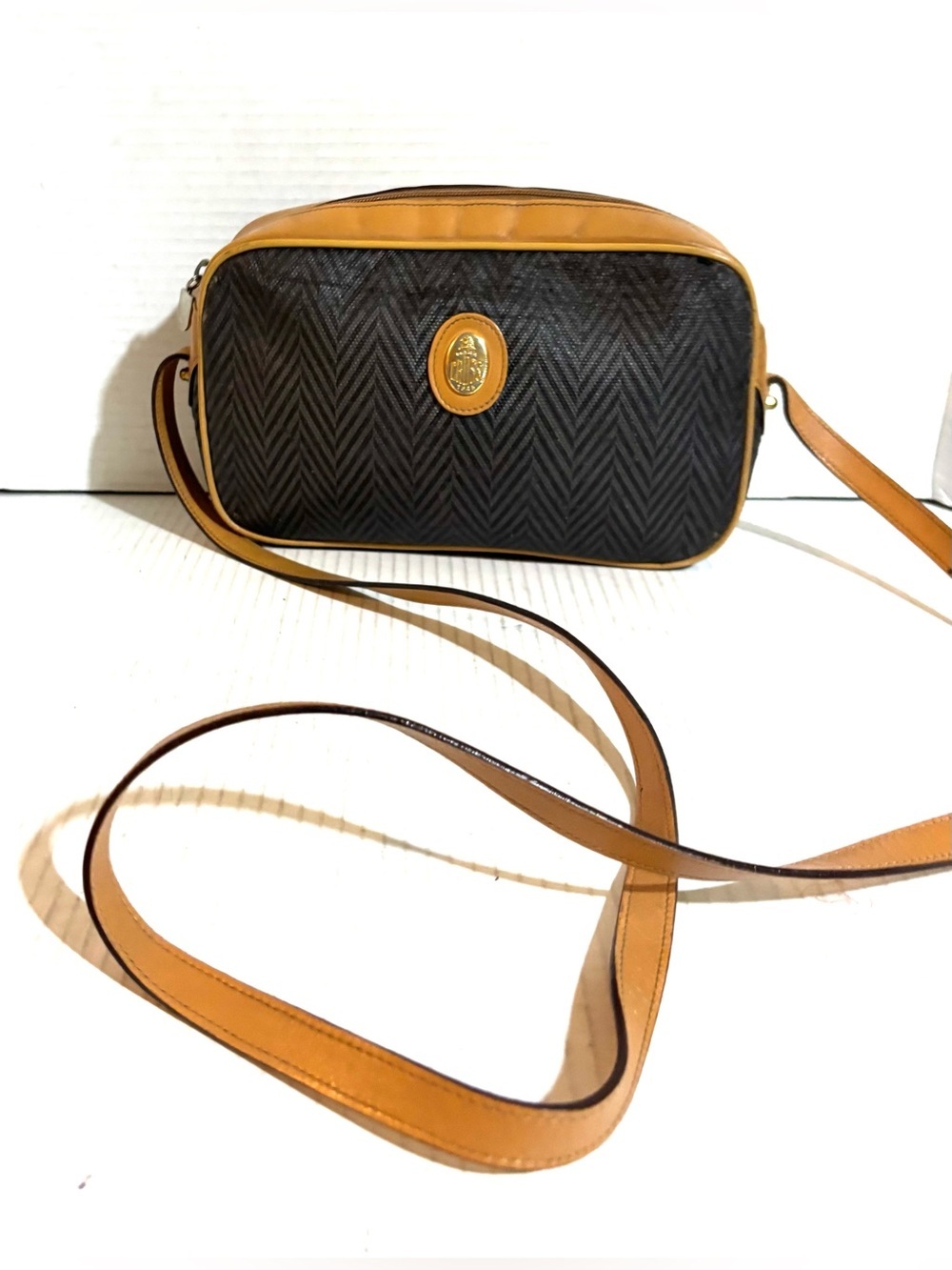 Vintage Black & Tan Crossbody Bag with Gold Emblem